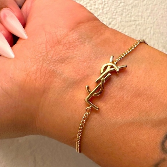 Gold Yves Saint Laurent Logo Bracelet - Picture 1 of 4